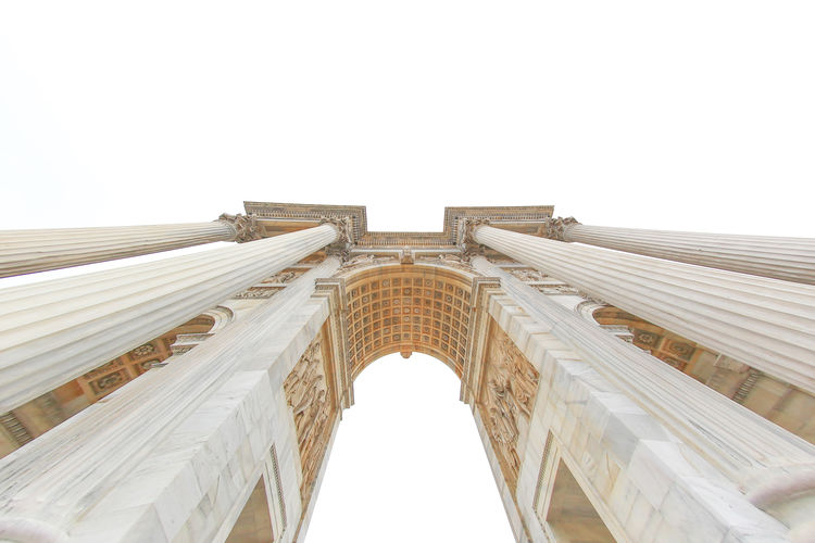 Low angle view of triumphal arch against clear sky