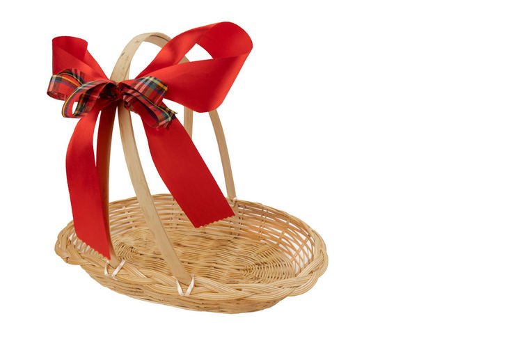 Close-up of red basket on white background
