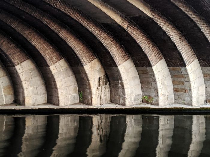 Reflection of built structure in river