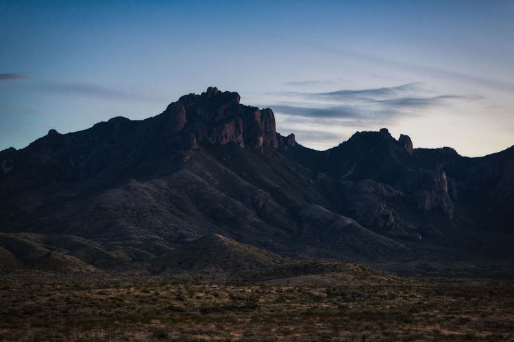 Scenic view of rocky mountains against sky in big bend national park - texas