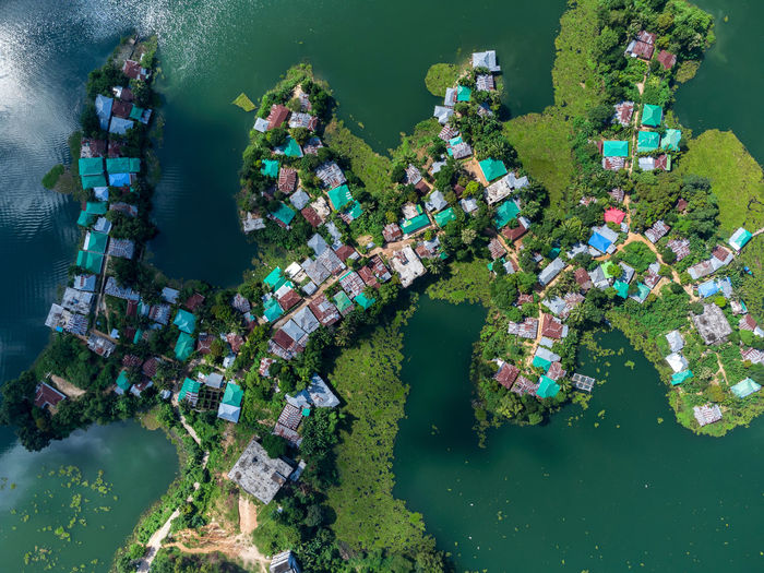 High angle view of people in house in lake