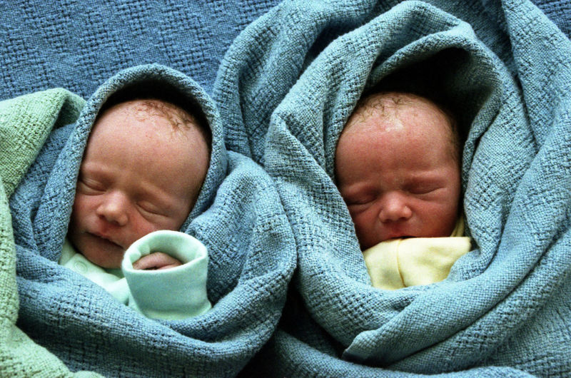 High angle view of twin babies sleeping