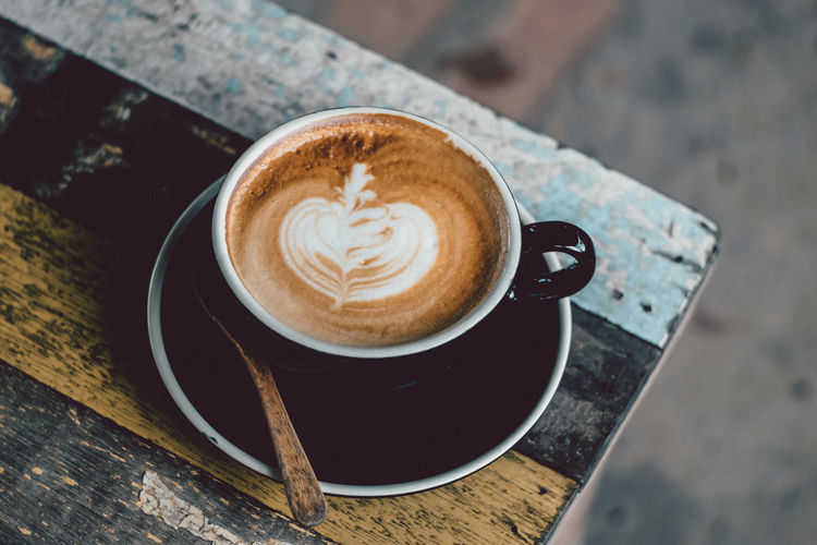 High angle view of cappuccino on table
