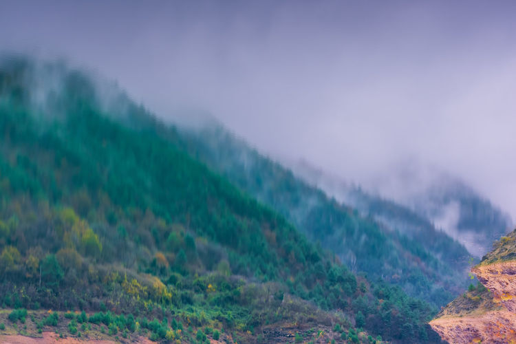 Scenic view of mountains against sky