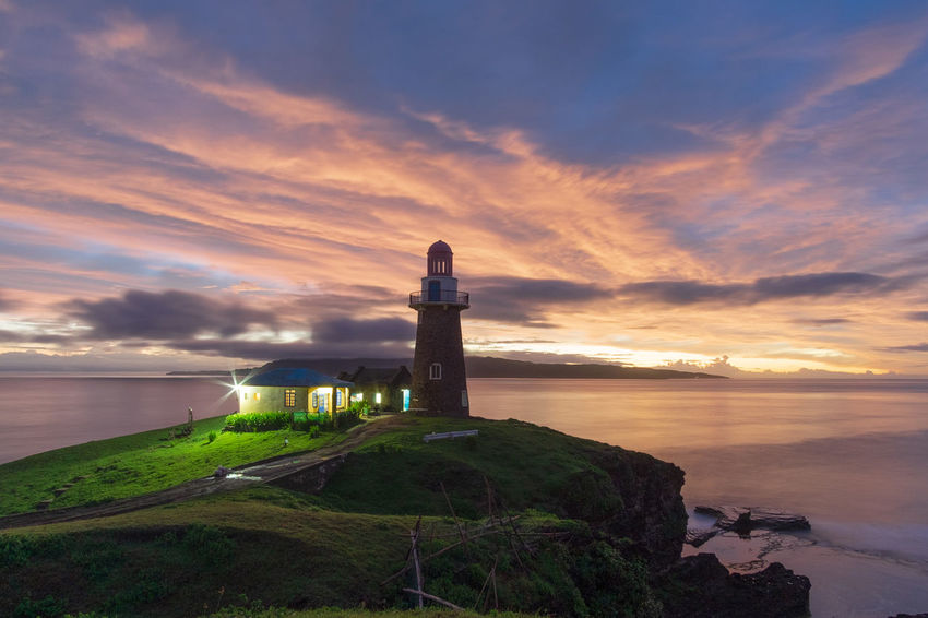 The sunrise of Sabtang Light House is one of the iconic place that ive visited in Batanes. The Batanes located in the upper part island of the Philippines. The Traveler - 2018 EyeEm Awards Water Sea Lighthouse Nautical Vessel Horizon Sunset Beach Nautical Equipment Beauty Business Finance And Industry