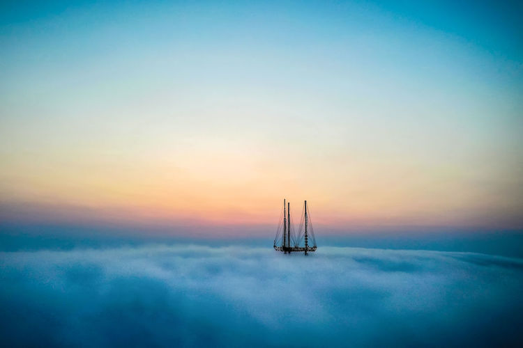 Sutro tower in san francisco appearing through fog