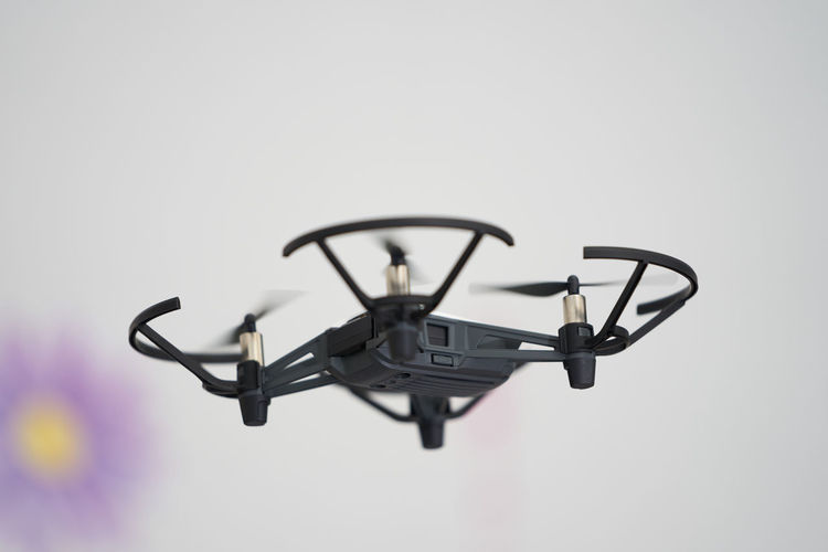 Low angle view of electric drone against white background