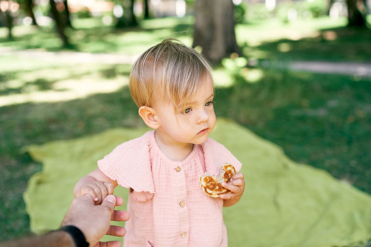 Cute girl holding ice cream