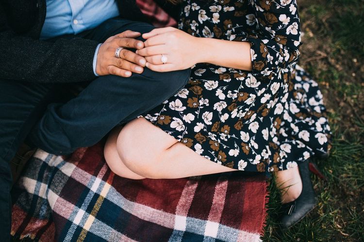 Low section of people sitting outdoors