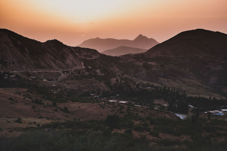 Scenic view of mountains during sunset