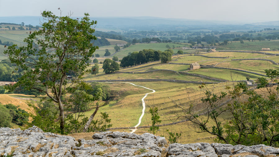 View of the limestone pavement above malham cove in the yorkshire dales national park
