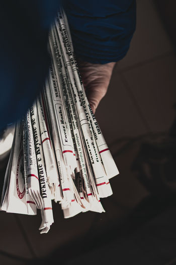 Close-up of hand holding book