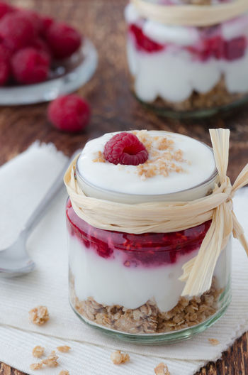Close-up of dessert in glass container on table