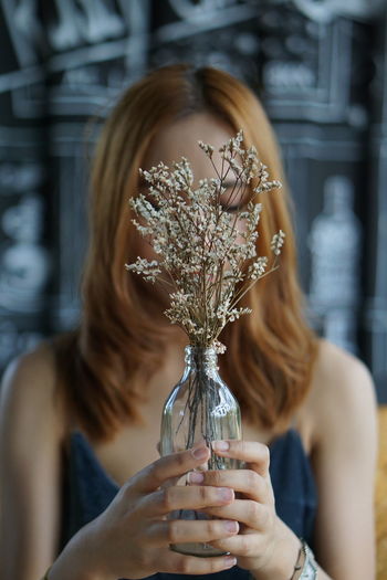 Woman holding flower