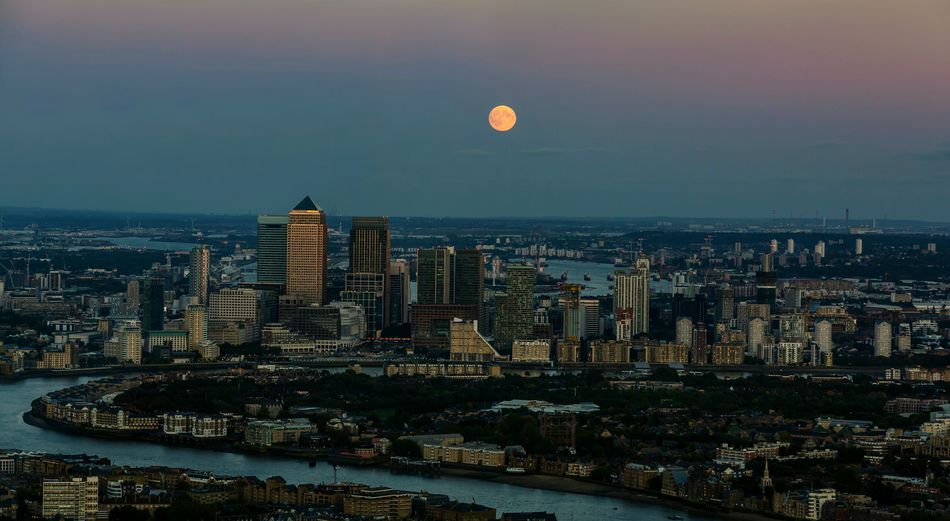 Cityscape against sky during sunset