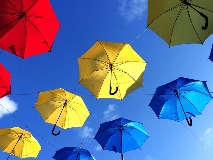 Low angle view of colorful umbrellas
