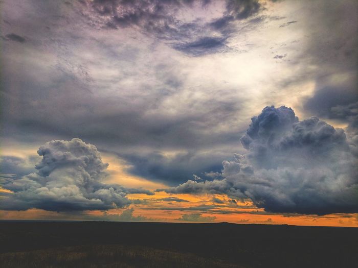 Scenic view of dramatic sky during sunset