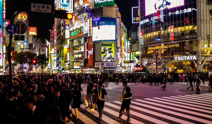 Crowd in city at night