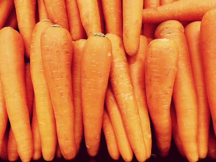 Full frame shot of carrots for sale at market stall