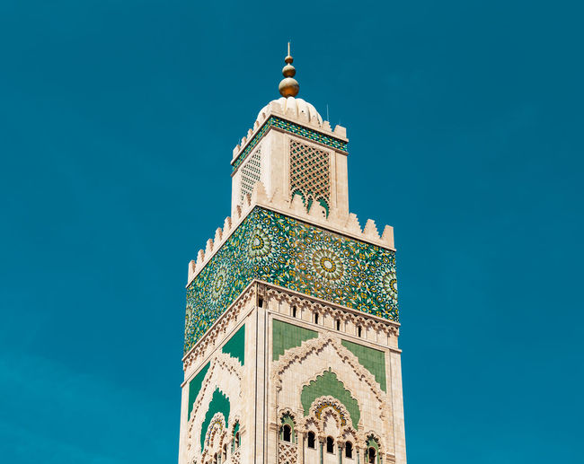 Low angle view of mosque against sky