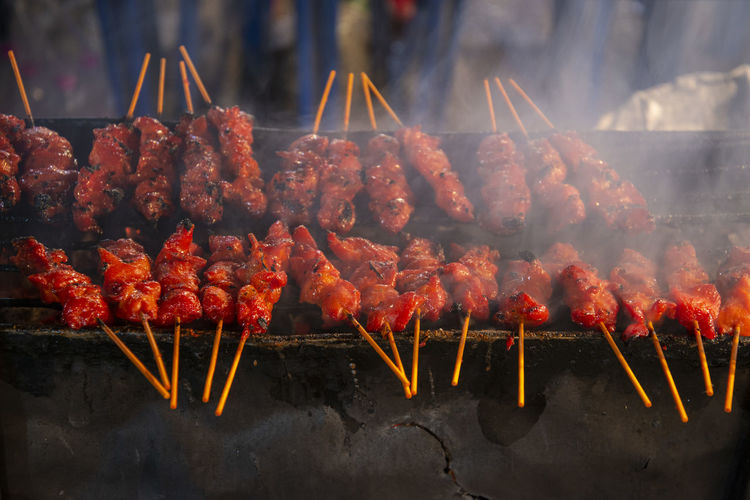 Close-up of meat on barbecue grill
