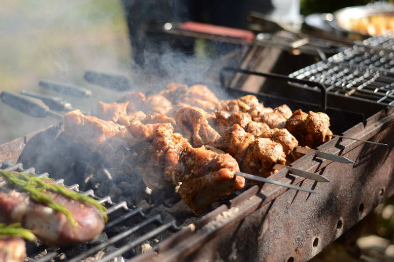 Close-up of meat on barbecue grill