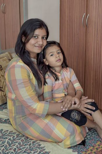 Portrait of mother and daughter