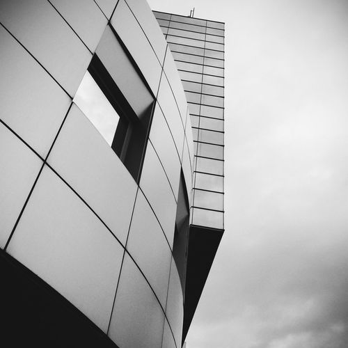 Low angle view of modern building against sky