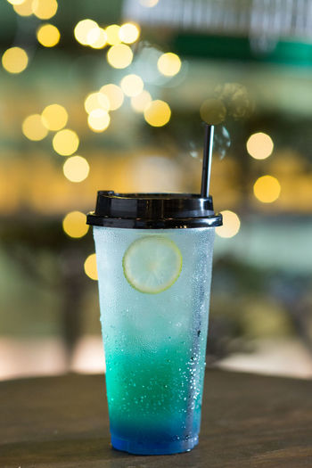 Close-up of cocktail in glass on table