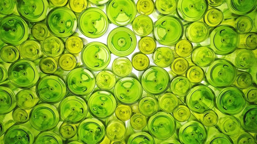 Full frame shot of green bottles
