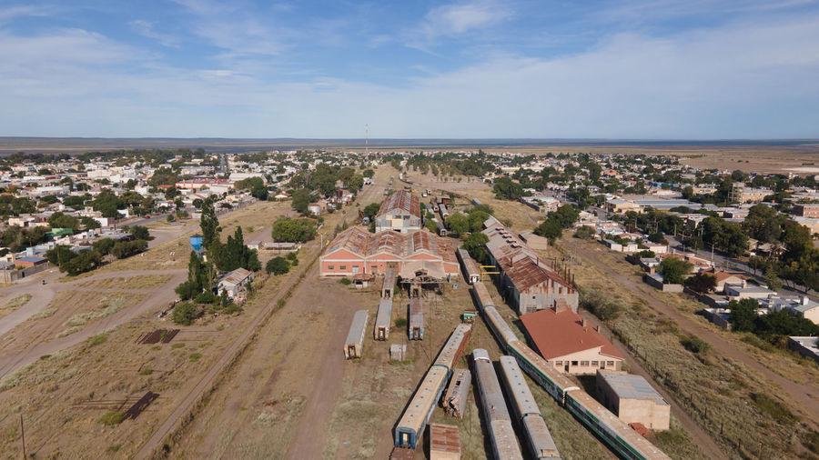 High angle view of abandoned trains against sky