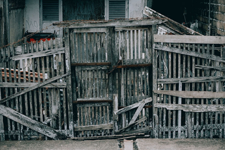 Old wooden, pontianak indonesia, 30/10/2019, fence in the middle of the modern city