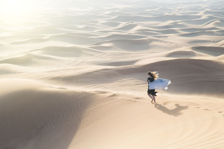 High angle view of woman at desert