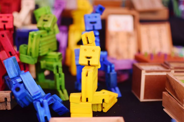 Colorful wooden toys on table