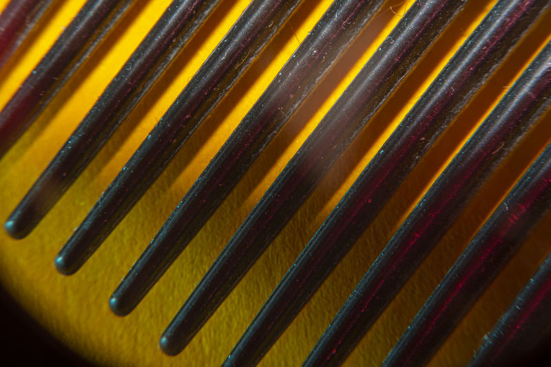 Close-up of comb on table