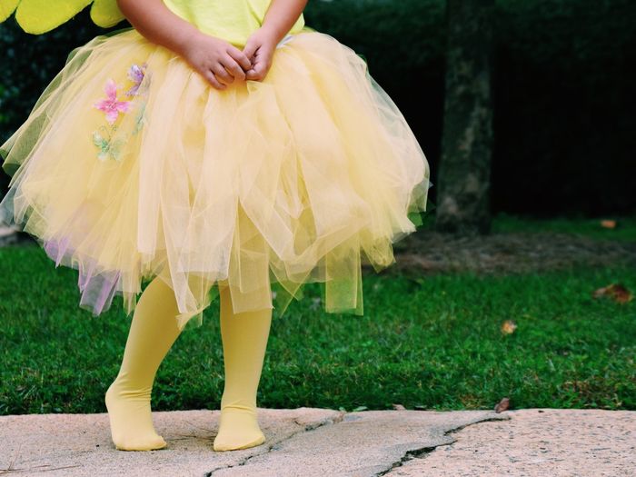 Low section of a young ballerina