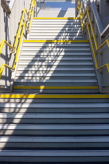 Empty stairs leading upwards in a london train station 