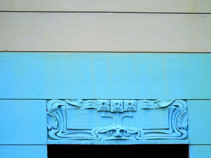 Low angle view of carvings on wall