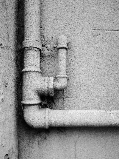 Close-up of pipe tied up