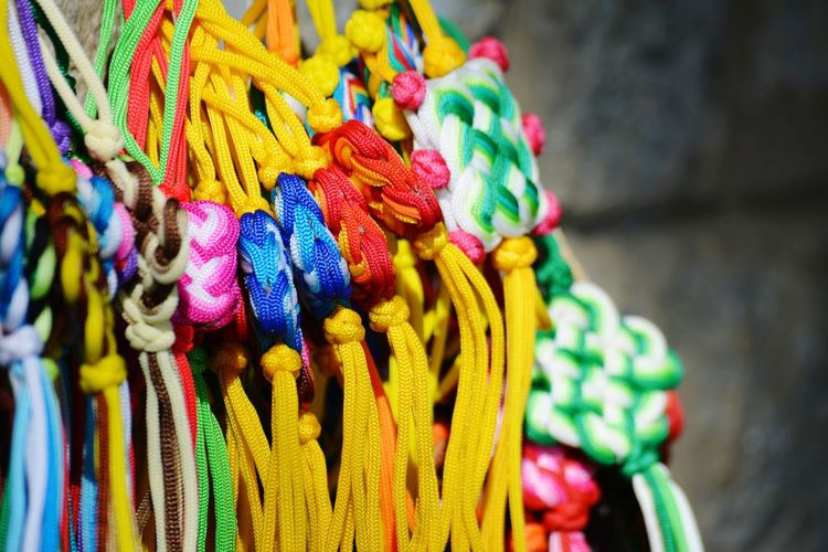 Close-up of multi colored band for sale