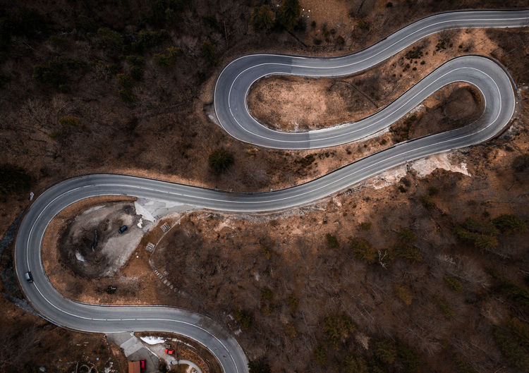 Aerial view of winding road on land