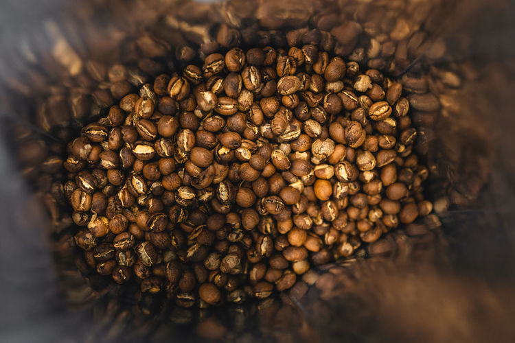 Roasted coffee beans in bags for sale