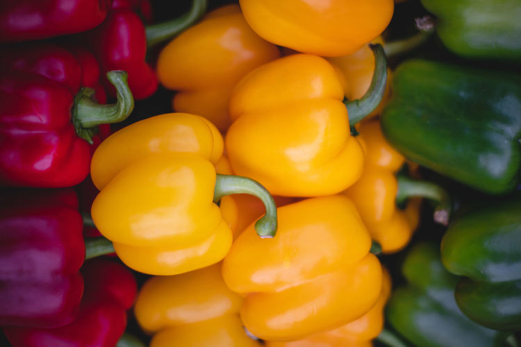 Close-up of yellow bell peppers for sale in market