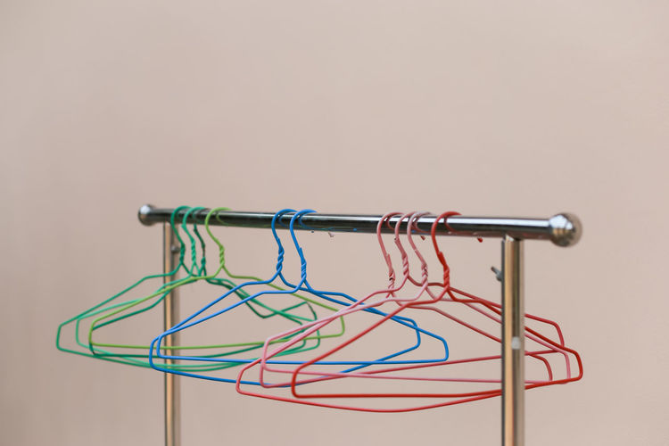 Close-up of metal hanging against wall