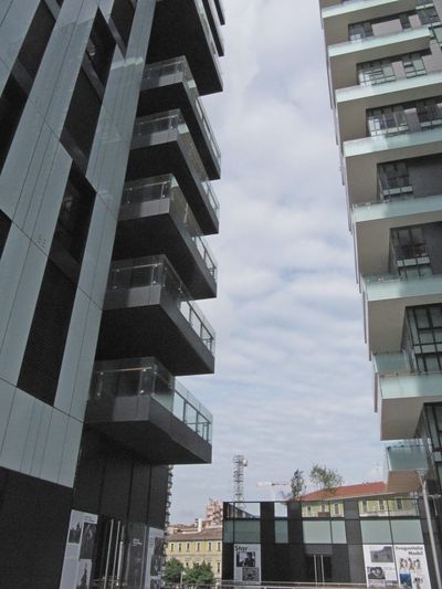 Low angle view of building against cloudy sky