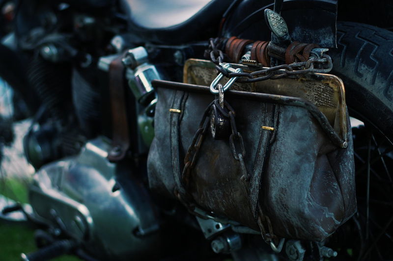 Close-up of bag hanging on motorcycle