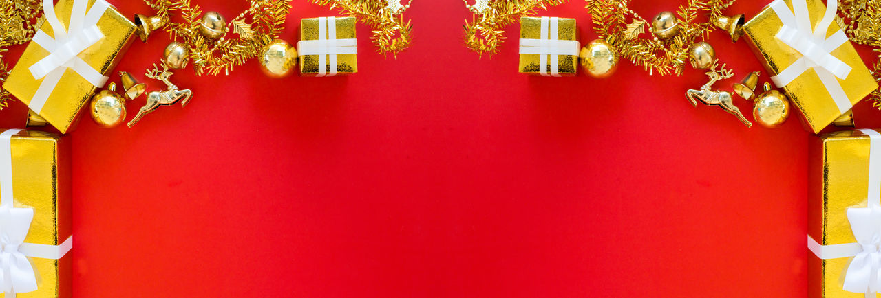 Close-up of red decoration hanging on wall