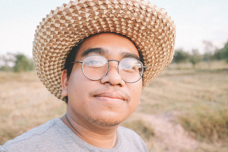 Portrait of man wearing hat