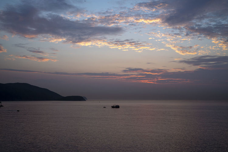 Scenic view of sea against sky during sunset