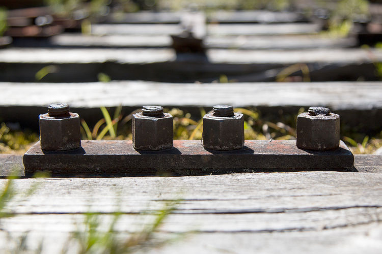 Surface level of nuts and bolts on railroad track